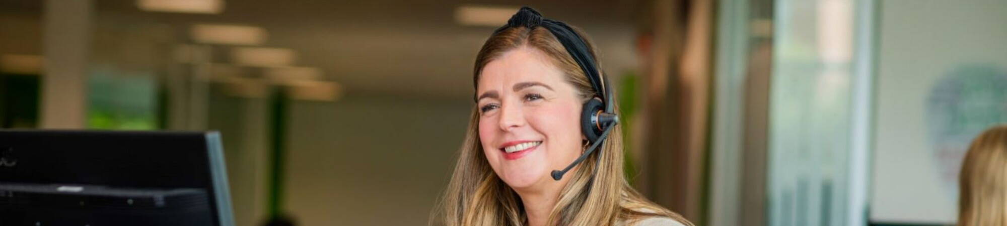 Lady with a headset banner